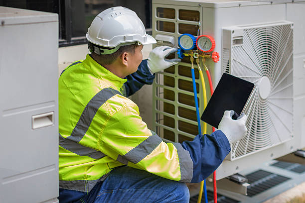 Professional Heat Pump Repair technician working in Clinton, IL